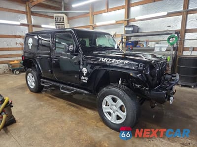 Czwarte zdjęcie samochodu z boku: 2020 JEEP WRANGLER UNLIMITED SPORT VIN:1C4HJXDN7LW347552 - miniatura