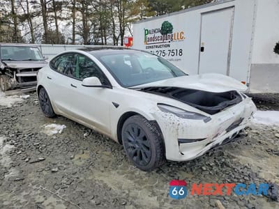 Czwarte zdjęcie samochodu z boku: 2022 TESLA MODEL 3 VIN:5YJ3E1EB0NF316599 - miniatura