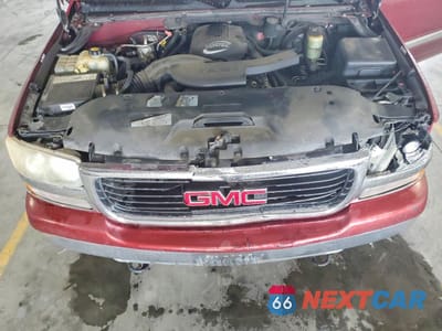 Zdjęcie 12 z 14 samochodu: 2002 GMC YUKON XL C1500 VIN:1GKEC16Z82J107601 - miniatura