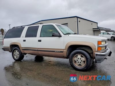 Czwarte zdjęcie samochodu z boku: 1995 CHEVROLET SUBURBAN K1500 VIN:1GNFK16KXSJ427239 - miniatura