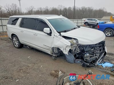 Czwarte zdjęcie samochodu z boku: 2021 CHEVROLET SUBURBAN K1500 HIGH COUNTRY VIN:1GNSKGKTXMR349145 - miniatura