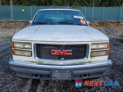 Piąte zdjęcie samochodu w środku: 1994 GMC SIERRA K1500 VIN:2GTEK19K5R1574945 - miniatura