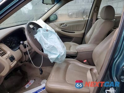 Zdjęcie 7 z 11 samochodu: 2002 HONDA ACCORD EX VIN:1HGCG165X2A009577 - miniatura