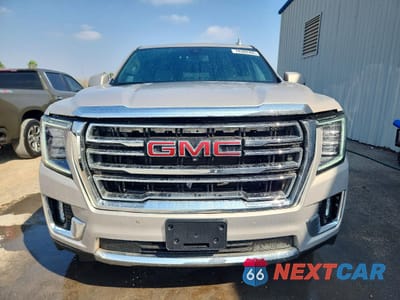 Piąte zdjęcie samochodu w środku: 2022 GMC YUKON SLT VIN:1GKS1BKD8NR357452 - miniatura
