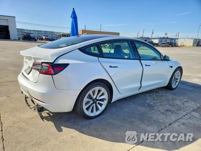 Trzecie zdjęcie samochodu z tyłu: 2022 TESLA MODEL 3 VIN:5YJ3E1EB7NF343394 - miniatura