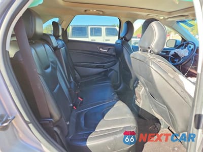 Zdjęcie 10 z 11 samochodu: 2019 FORD EDGE TITANIUM VIN:2FMPK4K95KBC70687 - miniatura