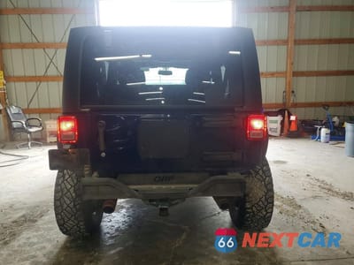 Zdjęcie 6 z 11 samochodu: 2013 JEEP WRANGLER UNLIMITED SPORT VIN:1C4BJWDG5DL558558 - miniatura