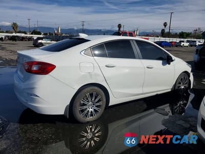 Trzecie zdjęcie samochodu z tyłu: 2017 CHEVROLET CRUZE LT VIN:3G1BE5SM4HS562326 - miniatura