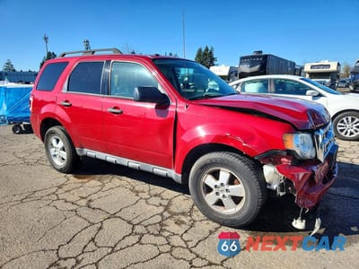 Czwarte zdjęcie samochodu z boku: 2011 FORD ESCAPE XLT VIN:1FMCU0DG0BKA93789 - miniatura