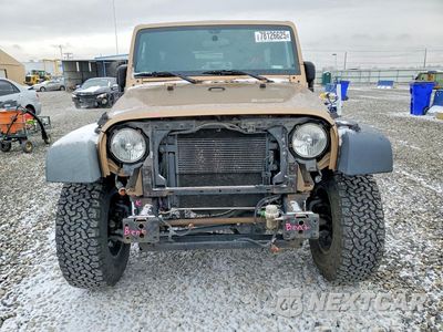 Piąte zdjęcie samochodu w środku: 2015 JEEP WRANGLER UNLIMITED SPORT VIN:1C4BJWDG9FL631613 - miniatura