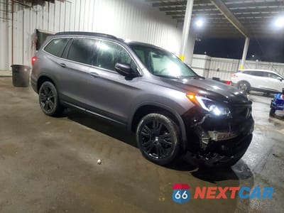 Czwarte zdjęcie samochodu z boku: 2022 HONDA PILOT SE VIN:5FNYF6H21NB081884 - miniatura