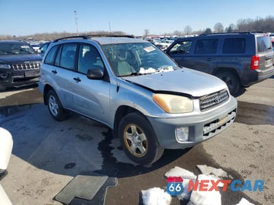 Czwarte zdjęcie samochodu z boku: 2001 TOYOTA RAV4 BASE VIN:JTEHH20V310064176 - miniatura