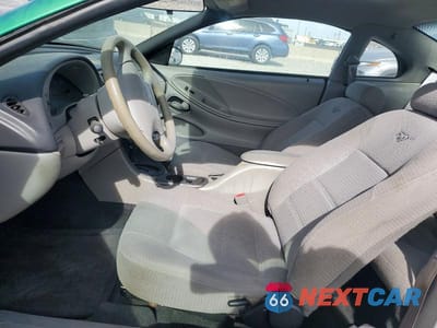 Zdjęcie 7 z 12 samochodu: 1999 FORD MUSTANG VIN:1FAFP4046XF119054 - miniatura