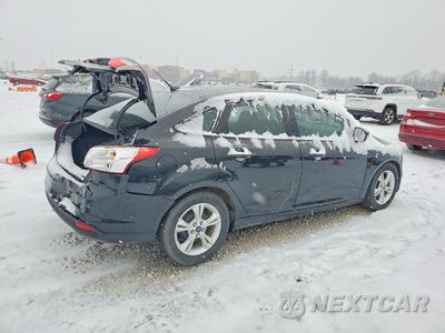 Trzecie zdjęcie samochodu z tyłu: 2014 FORD FOCUS SE VIN:1FADP3F21EL450372 - miniatura