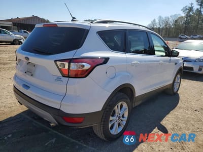 Trzecie zdjęcie samochodu z tyłu: 2018 FORD ESCAPE SE VIN:1FMCU0GD3JUB47641 - miniatura