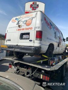 Czwarte zdjęcie samochodu z boku: 2007 FORD ECONOLINE E350 SUPER DUTY VAN VIN:1FTSE34LX7DA82869 - miniatura