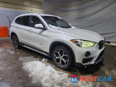 Czwarte zdjęcie samochodu z boku: 2016 BMW X1 XDRIVE28I VIN:WBXHT3C31G5E48753 - miniatura