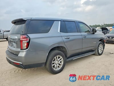 Trzecie zdjęcie samochodu z tyłu: 2021 CHEVROLET TAHOE C1500 LT VIN:1GNSCNKD5MR117028 - miniatura