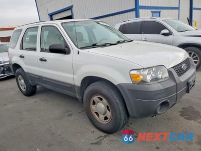 Czwarte zdjęcie samochodu z boku: 2006 FORD ESCAPE XLS VIN:1FMYU02Z06KA51574 - miniatura