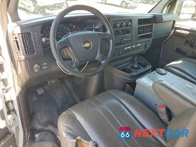 Zdjęcie 8 z 14 samochodu: 2013 CHEVROLET EXPRESS 2500 CARGO UTILITY / SERVICE VAN VIN:1GCWGFCB2D1902493 - miniatura