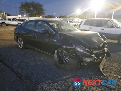 Czwarte zdjęcie samochodu z boku: 2021 HONDA CLARITY TOURING VIN:JHMZC5F37MC000559 - miniatura