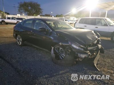 Czwarte zdjęcie samochodu z boku: 2021 HONDA CLARITY TOURING VIN:JHMZC5F37MC000559 - miniatura