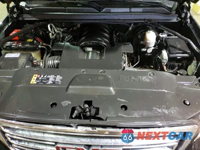 Zdjęcie 12 z 14 samochodu: 2018 GMC YUKON SLE VIN:1GKS2AKC2JR383554 - miniatura