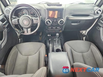 Zdjęcie 8 z 13 samochodu: 2015 JEEP WRANGLER UNLIMITED SAHARA VIN:1C4BJWEG9FL723271 - miniatura