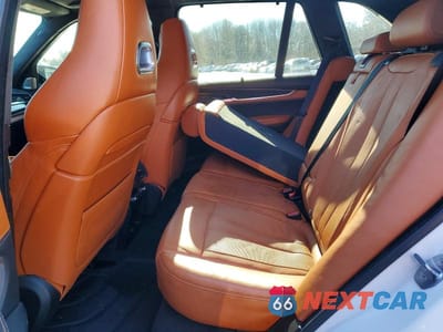 Zdjęcie 11 z 13 samochodu: 2016 BMW X5 M VIN:5YMKT6C5XG0R78050 - miniatura