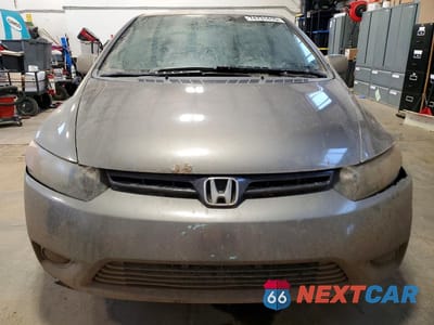 Piąte zdjęcie samochodu w środku: 2007 HONDA CIVIC LX VIN:2HGFG11697H013688 - miniatura