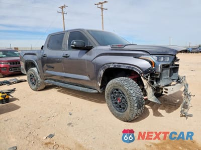 Czwarte zdjęcie samochodu z boku: 2024 TOYOTA TUNDRA TRD PRO HV VIN:5TFPC5DB2RX040907 - miniatura