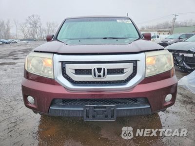 Piąte zdjęcie samochodu w środku: 2011 HONDA PILOT EXL VIN:5FNYF4H55BB080022 - miniatura