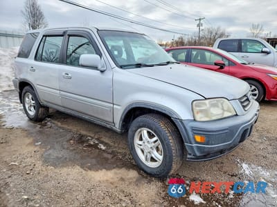 Czwarte zdjęcie samochodu z boku: 2001 HONDA CR-V SE VIN:JHLRD18761C034532 - miniatura