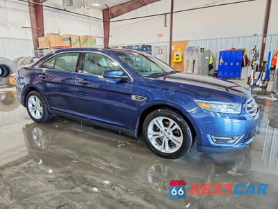 Czwarte zdjęcie samochodu z boku: 2016 FORD TAURUS SEL VIN:1FAHP2E87GG104761 - miniatura