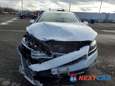 Piąte zdjęcie samochodu w środku: 2015 VOLVO S60 PREMIER+ VIN:YV140MFC0F1317929 - miniatura