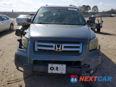 Piąte zdjęcie samochodu w środku: 2006 HONDA PILOT EX VIN:2HKYF18436H563974 - miniatura