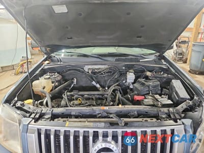 Zdjęcie 12 z 12 samochodu: 2010 MERCURY MARINER VIN:4M2CN8B76AKJ20263 - miniatura