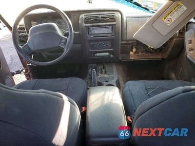 Zdjęcie 8 z 12 samochodu: 1999 JEEP CHEROKEE SPORT VIN:1J4FF68SXXL653133 - miniatura
