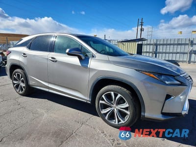 Czwarte zdjęcie samochodu z boku: 2017 LEXUS RX 450H BASE VIN:2T2BGMCA7HC016404 - miniatura