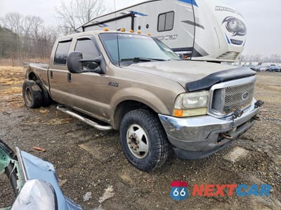 Czwarte zdjęcie samochodu z boku: 2002 FORD F350 SUPER DUTY VIN:1FTWW33F52ED47386 - miniatura