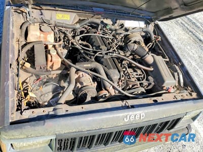 Zdjęcie 12 z 13 samochodu: 1992 JEEP CHEROKEE SPORT VIN:1J4FJ88S3NL116305 - miniatura
