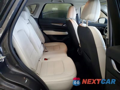 Zdjęcie 11 z 14 samochodu: 2023 MAZDA CX-5 PREMIUM VIN:JM3KFBDM1P0180347 - miniatura