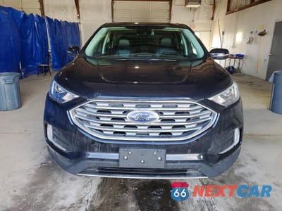Piąte zdjęcie samochodu w środku: 2022 FORD EDGE TITANIUM VIN:2FMPK4K98NBA94528 - miniatura