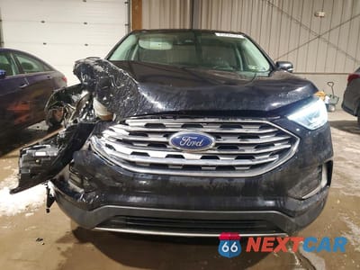 Piąte zdjęcie samochodu w środku: 2022 FORD EDGE TITANIUM VIN:2FMPK4K90NBA95012 - miniatura