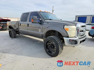 Czwarte zdjęcie samochodu z boku: 2011 FORD F350 SUPER DUTY VIN:1FT8W3BT0BEC51343 - miniatura