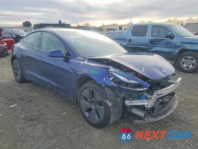 Czwarte zdjęcie samochodu z boku: 2023 TESLA MODEL 3 VIN:5YJ3E1EA4PF648541 - miniatura