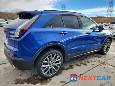 Trzecie zdjęcie samochodu z tyłu: 2021 CADILLAC XT4 SPORT VIN:1GYFZFR45MF013719 - miniatura
