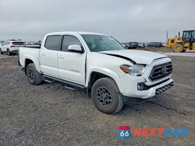 Czwarte zdjęcie samochodu z boku: 2022 TOYOTA TACOMA SR5 V6 VIN:3TMAZ5CNXNM160938 - miniatura