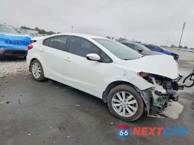 Czwarte zdjęcie samochodu z boku: 2014 KIA FORTE LX VIN:KNAFX4A60E5182922 - miniatura