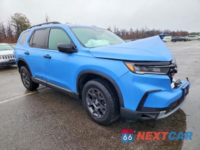 Czwarte zdjęcie samochodu z boku: 2025 HONDA PILOT TRAILSPORT VIN:5FNYG1H6XSB038028 - miniatura